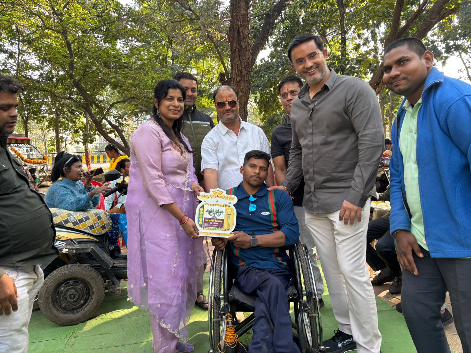Disabled people sang melodious songs and displayed their talent and received honors and awards